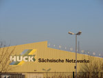 Werbungsapplikation Fassade Huck in Heidenau